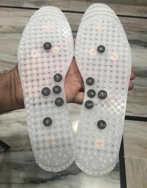Acupressure insoles with massage points for foot pain relief and improved circulation